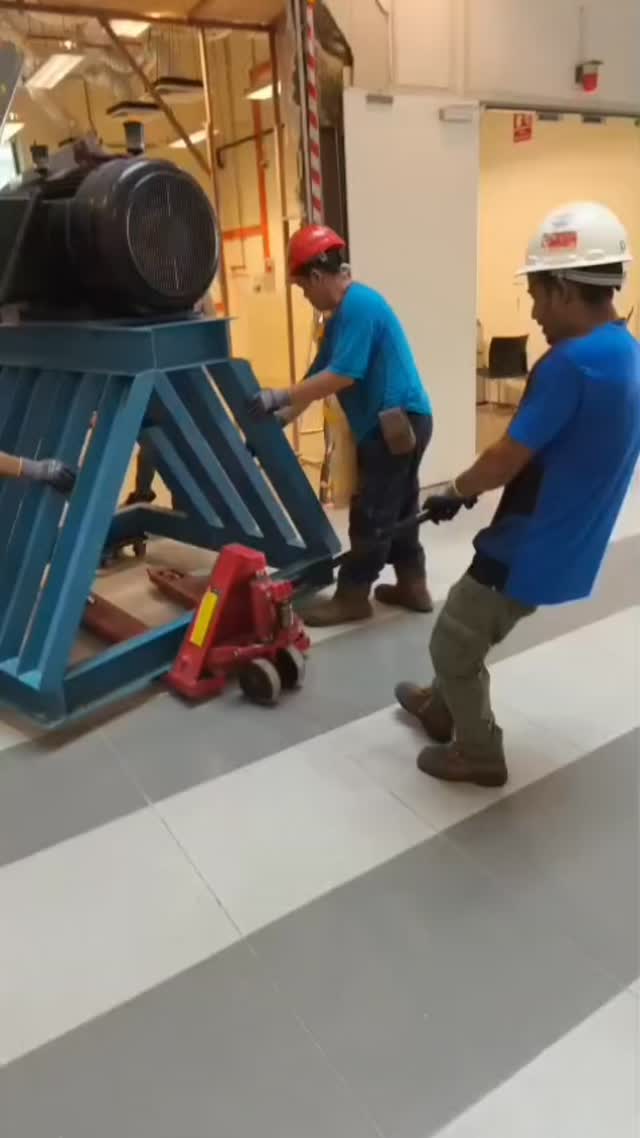 Equipment moving crew on site